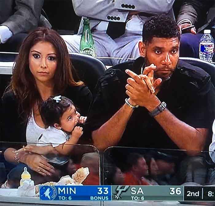 A picture of Vanessa with her partner and daughter.